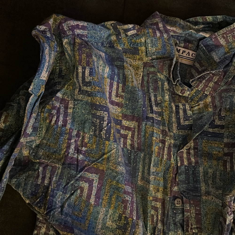 Vintage Impact button -up shirt with rad design.